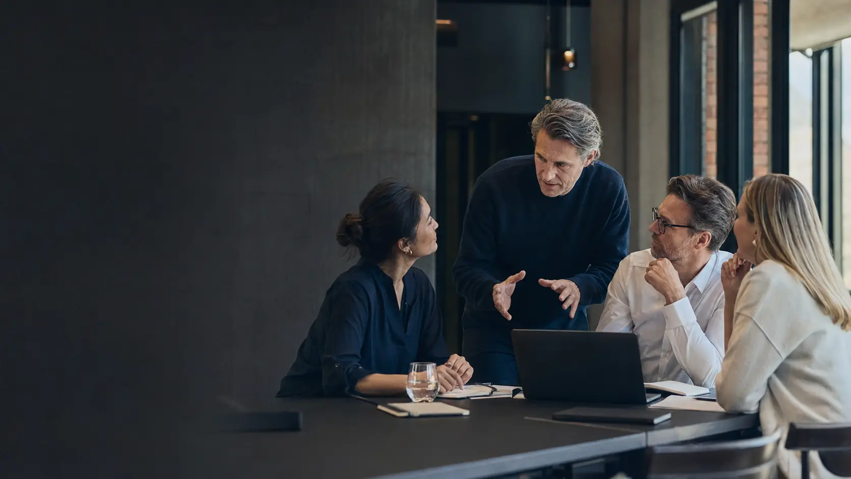 Technology and business specialists working together